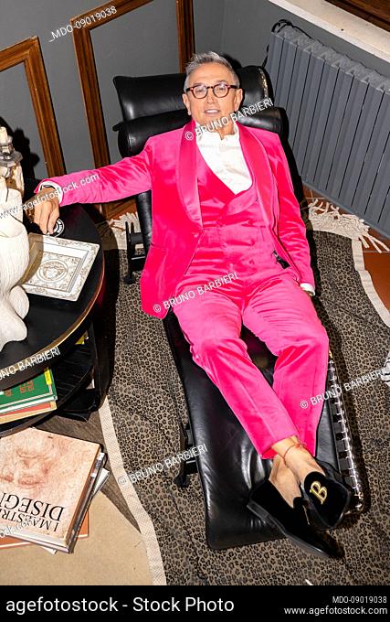 Italian chef Bruno Barbieri, portrayed at showroom of the italian designer Gabriele Pasini, wears the fluo fuchsia smooth velvet suit used for the final of the...