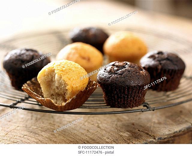 Several mini muffins on a cooling rack