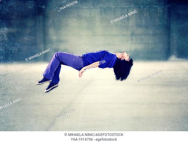 Woman levitating