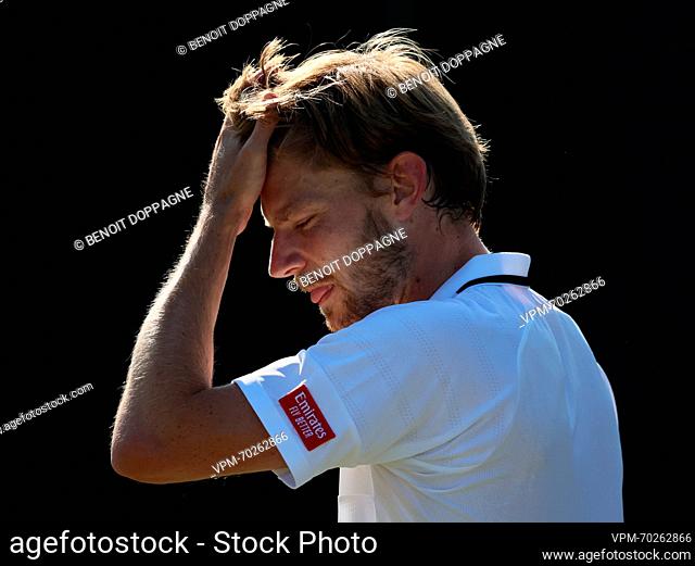 Belgian David Goffin reacts during a tennis match between Belgian Goffin and Russian Rublev, in round three of the men's singles at the 2023 Wimbledon grand...