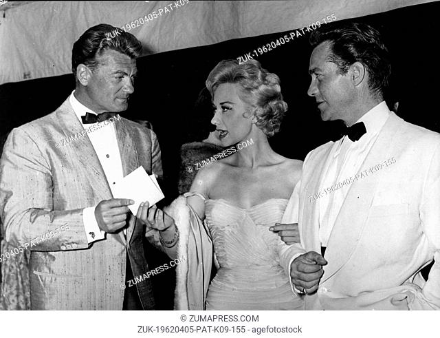 May 15, 1958 - Cannes, France - Actress CAROLE LESLEY and date RICHARD TODD chat with actor JEAN MARAIS at the Festival Hall for the Cannes Film Festival