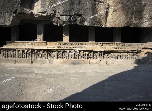 Ellora Caves, Aurangabad, Maharashtra, India Rock-cut cave temple No. 16 (Kailasa) North side, showing gods and goddess on the plinth