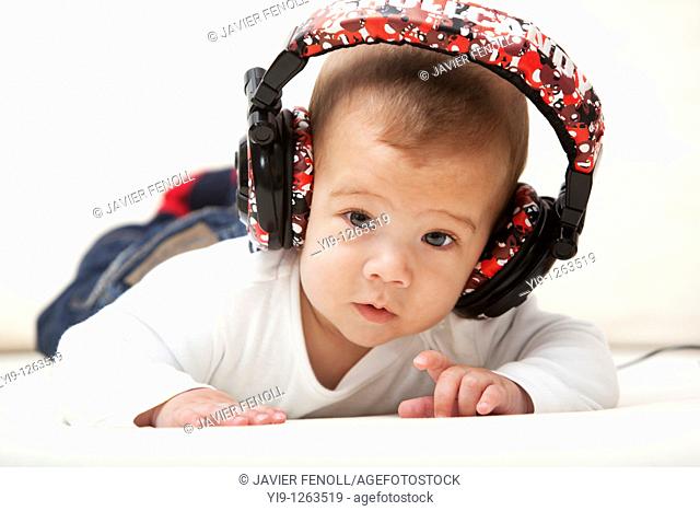 Little child with headphones