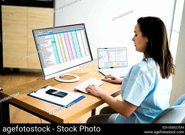 Medical Bill Codes And Spreadsheet Data. Business Analyst Woman