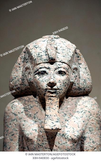 Kneeling figure of Queen Hatshepsut with cultic vessel at Neues Museum or New Museum on Museumsinsel or Museum Island in Berlin