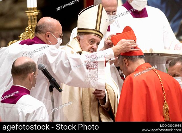 Pope Francis presides over the public consistory for the creation of thirteen new cardinals in the Vatican Basilica, maintaining severe anti-Covid-19 measures