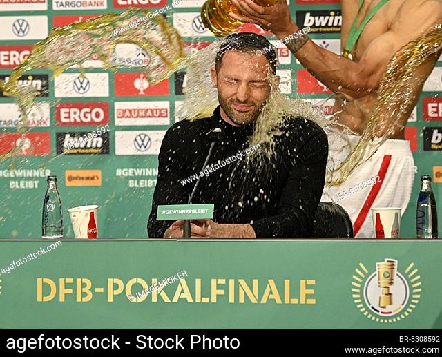 Beer shower for coach Domenico Tedesco, RasenBallsport Leipzig, during the press conference, RB Leipzig wins the DFB Cup final, 79th DFB Cup final
