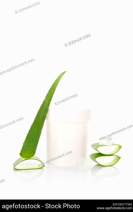 Aloe vera cosmetics. Aloe vera, sliced leaf, and aloe vera cosmetics isolated on white background