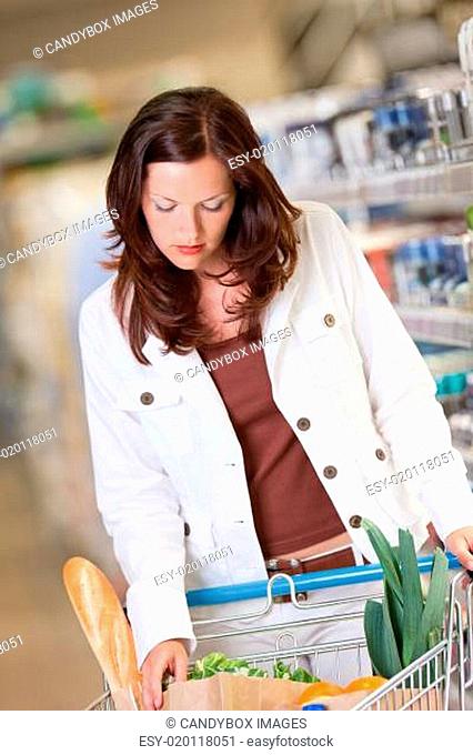 Shopping series - Young woman in a supermarket