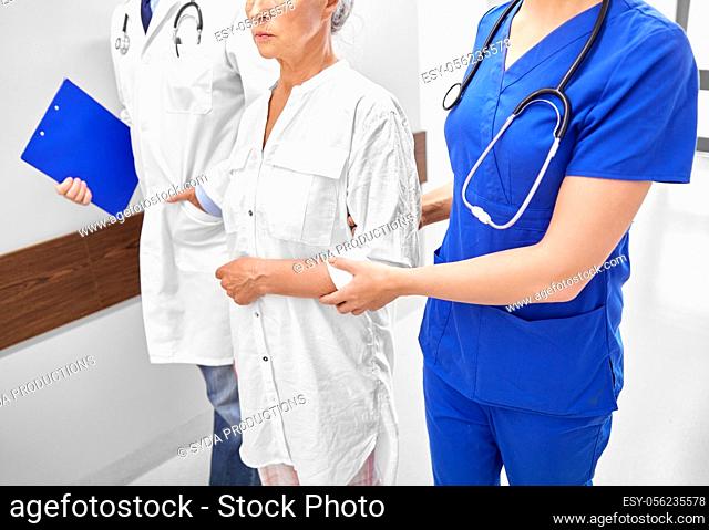 senior woman, doctor and nurse at hospital