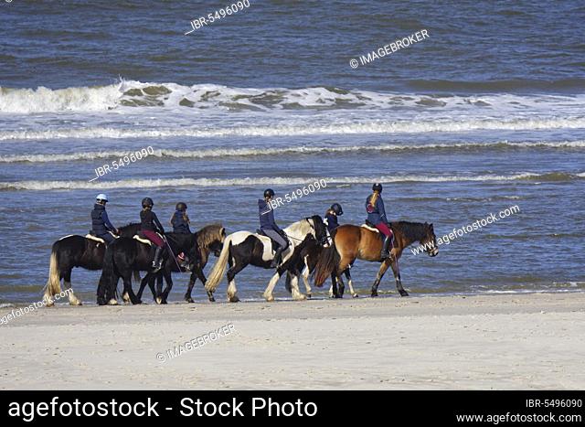 Riders on the beach of Langeoog, Langeoog, Lower Saxony, Germany, Europe