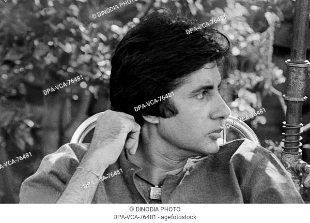 South Asian , Indian Bollywood Film Star Actor Amitabh Bachchan shot during a break at Chandivali studios , Mumbai bombay , India NO MODEL RELEASED