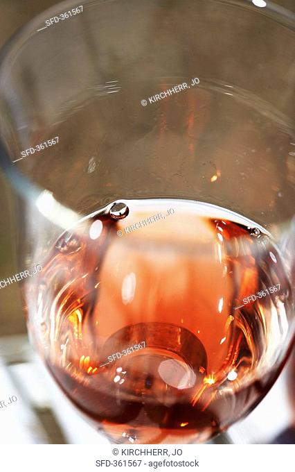 Glass of rosé wine close-up
