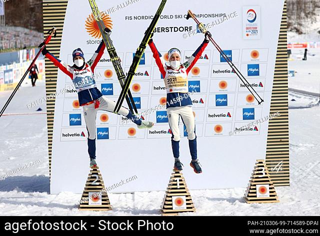 06 March 2021, Bavaria, Oberstdorf: Nordic skiing: World Championships: Cross-country, 30 km classic, women. Winner Therese Johaug from Norway (r) and runner-up...