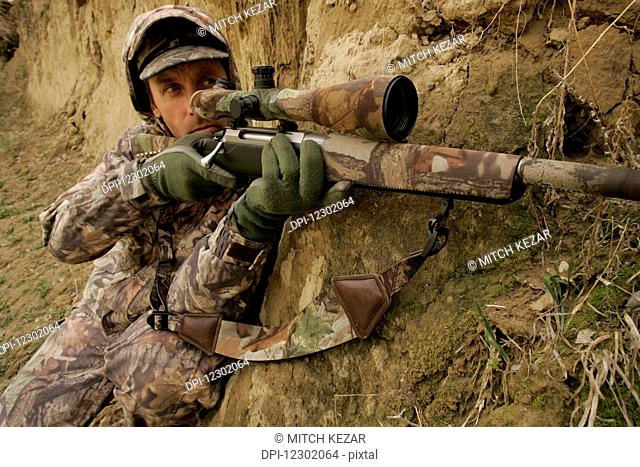 Varmint Hunter With Rifle