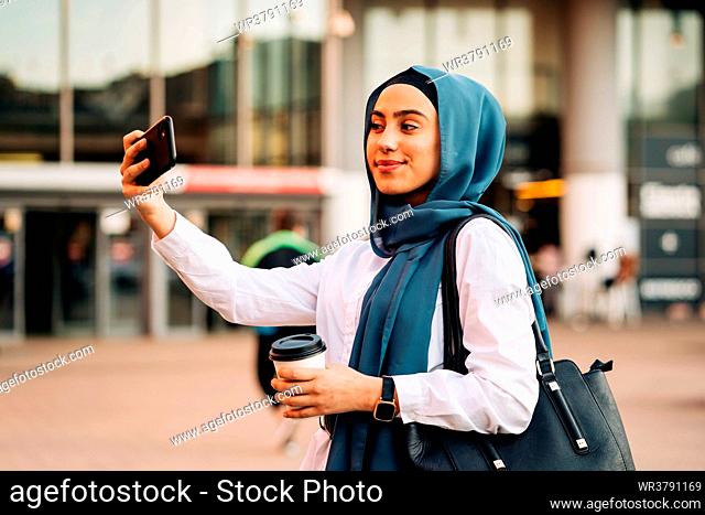 on the move, urban, muslim, selfie