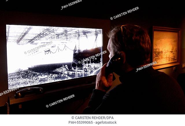 A visitor watches a film on the ship 'Wilhelm Gustloff' in Luebeck, Germany, 28 January 2015. The exhibition 'War eigentlich ein schoenes Schiff .