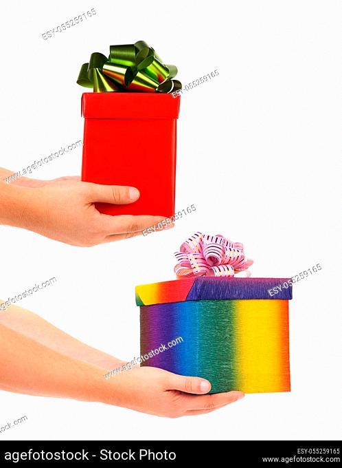 Two hands giving presents. Isolated on a white background