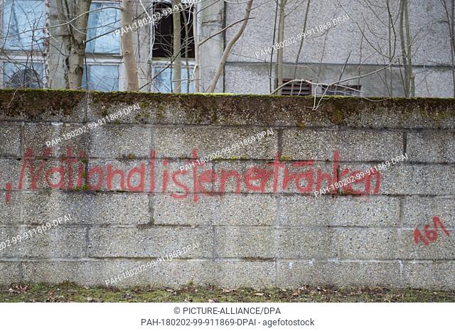 A graffiti reading ""nationalists drown"" across the ""Neisseblick"" hotel in Ostritz, Germany, 01 Febuary 2018. The National Democratic Party of Germany (NPD)...
