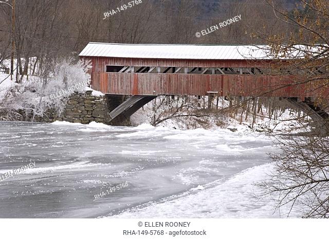 A red covered wooden bridge in Taftsville, Vermont, New England, United States of America, North America