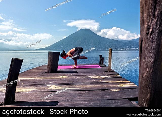 Morning yoga on the dock, San Marcos, Lake Atitlan, Guatemala