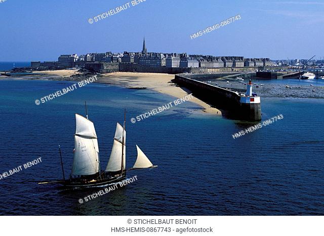 France, Ille et Vilaine, Côte d'Emeraude (Emerald Cost), Saint Malo, the Bisquine La Cancalaise in front of the fortified city (aerial view)