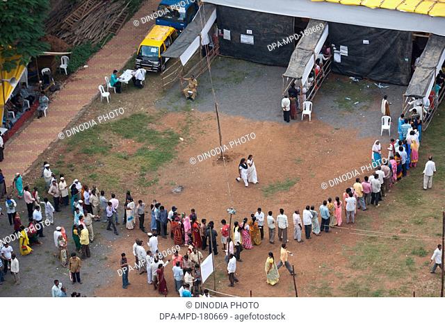 Voters in queue polling station Mumbai Maharashtra India Asia Oct 2009