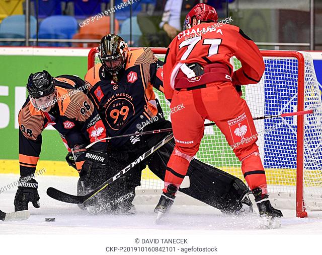(L-R) Alexander Winkler and Cristopher Nihlstorp of Graz and Richard Nedomlel of Hradec Kralove in action during the Ice Hockey Champions League group H game...
