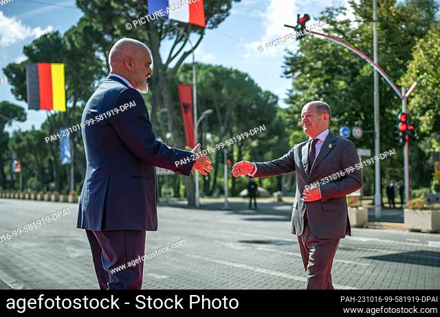 16 October 2023, Albania, Tirana: German Chancellor Olaf Scholz (SPD, r) is welcomed by Edi Rama, Prime Minister of Albania, at the Western Balkans Summit