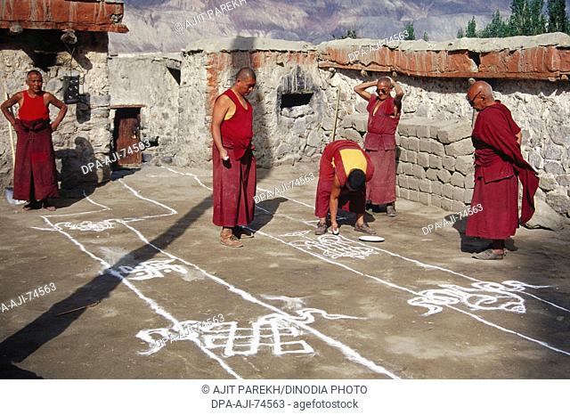 Buddhist Lamas making 'Rangoli' - Samtanling Gompa - Sumar Village , Nubra Valley , Ladakh , India