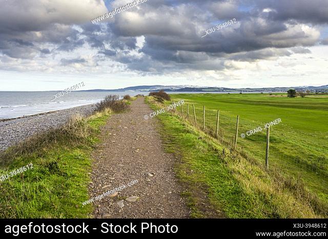 The West Somerset Coast Path along the Bristol Channel between Minehead and Dunster Beach in winter looking east, Somerset, England