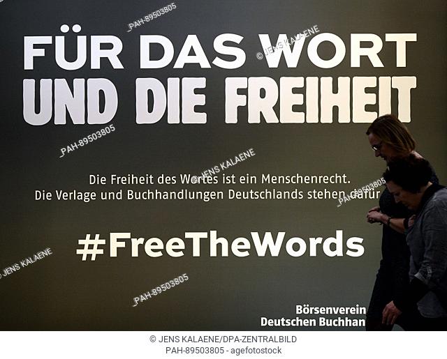 Lettering that reads 'Fuer das Wort und die Freiheit' (lit. For the word and the freedom) seen at the booth of the German Publishers' and Booksellers'...