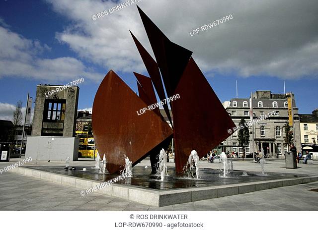 Republic of Ireland, County Galway, Galway, The Fountain in Eyre Square, built in 1984, consists of a copper-coloured representation of the sails of the Galway...