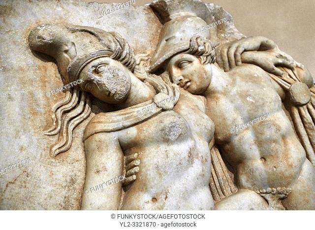 Detail of a Roman Sebasteion relief sculpture of Achilles and a dying Amazon, Aphrodisias Museum, Aphrodisias, Turkey. Against an art background.