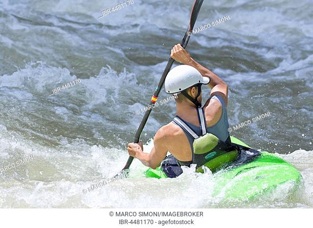 Kayak surfing in whitewater, Pacuare river, Turrialba, Costa Rica