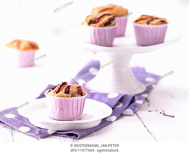 Plum muffins with sesame seeds