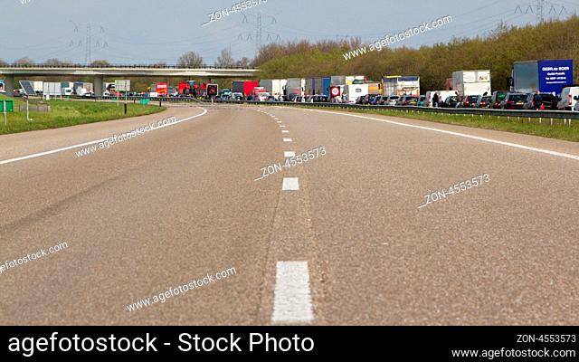 DRONTEN, FLEVOLAND, HOLLAND-APRIL 24: A truck colliding with a large brigde in the highway A6 has caused a large traffic jam on April 24, 2012 at Dronten