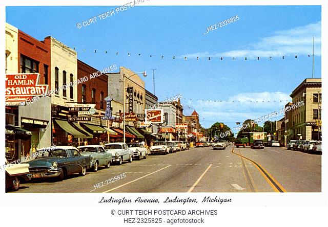 Ludington Avenue, Ludington, Michigan, USA, 1959. Street scene showing cars and building facades