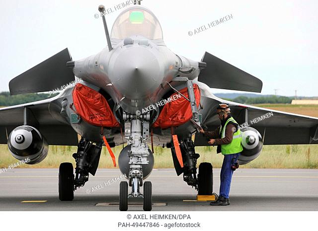 Technicians prepare F-16 fighter jets at the airbase in Jagel, Germany, 17 June 2014. The NATO air exercise ""Tiger Meet"" is taking place in Jagel with 1
