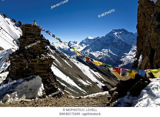STONE CHORTEN and ANNAPURNA THREE at 7553 meters as seen from the KANG LA PASS on the NAR PHU TREK, Nepal, Annapurna Conservation Area