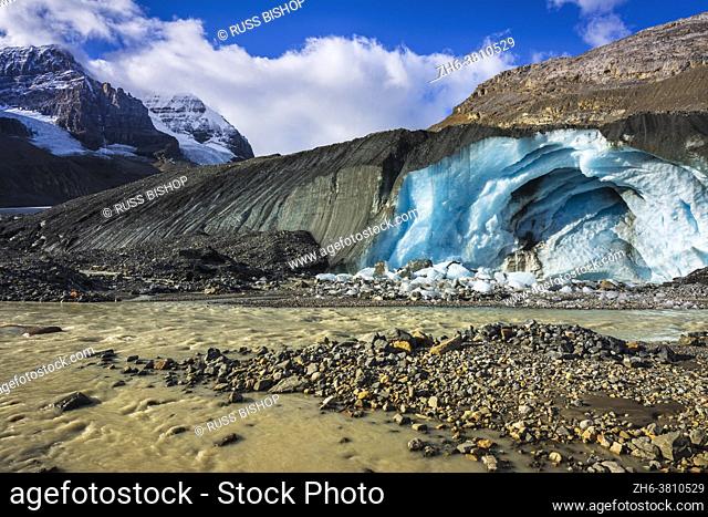 Blue ice and melt water at the toe of the Athabasca Glacier, Jasper National Park, Alberta, Canada