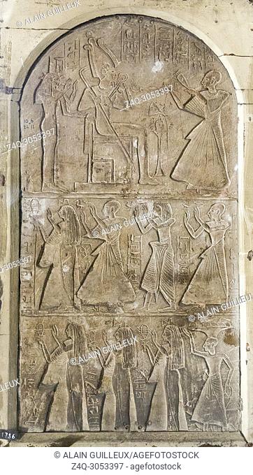 Egypt, Cairo, Egyptian Museum, round-topped stela, in three registers, of. Any, who's title ""general of the estate of Amun"" is very rare