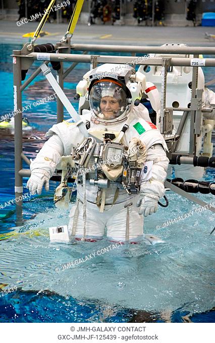 European Space Agency astronaut Samantha Cristoforetti, Expedition 4243 flight engineer, attired in a training version of her Extravehicular Mobility Unit (EMU)...