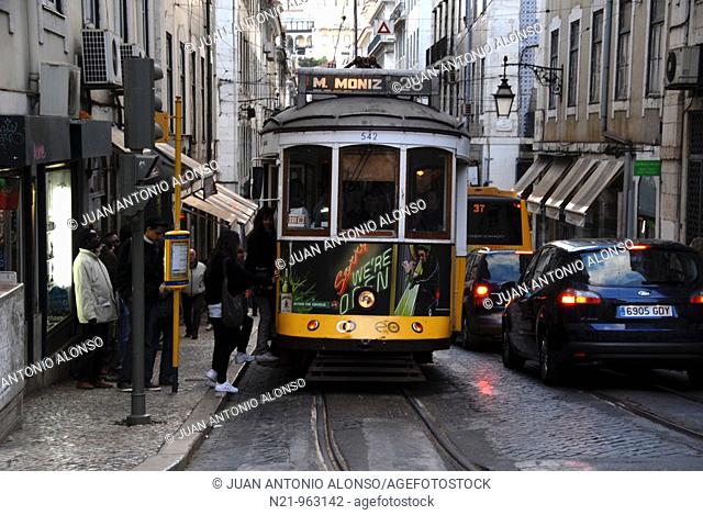 People boarding the popular  tram 28 on the Rua da Conceiçao. Baixa, Lisbon, Portugal