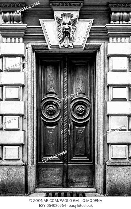 Italy, Turin. This city is famous to be a corner of two global magical triangles. This old door has been guarded by a gargoyle in last hundred years