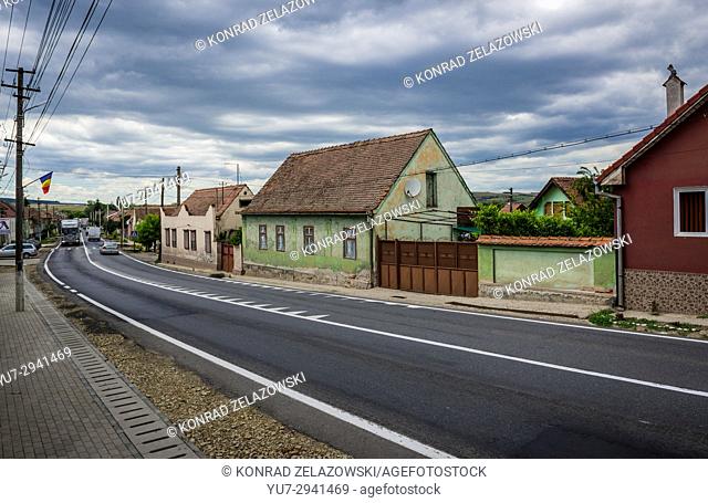 Row traditional Saxon-style houses along main road in Miercurea Sibiului town of Sibiu County in southern Transylvania, Romania