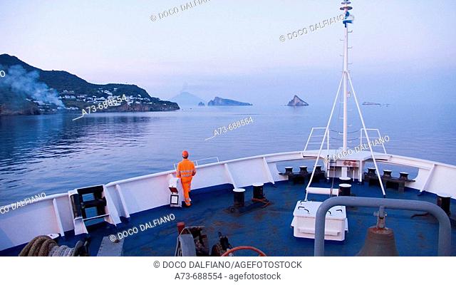 View of Stromboli and Basiluzzo from ferry boat. Eolian Islands, Sicily, Italy