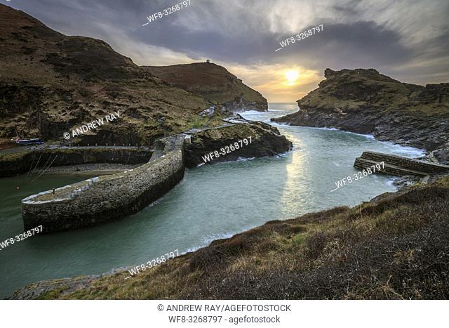 The entrance to the harbour at Boscastle, on the north coast of Cornwall. Captured from a high vantage point, at sunset in early March