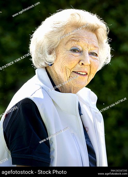 Princess Beatrix of The Netherlands volunteering during NLDoet organized by Oranje Fonds at Thomashuis center for people with a disability in Maartensdijk
