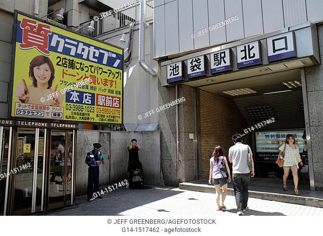 Japan, Tokyo, Ikebukuro, Ikebukuro Station North Entrance, kanji, hiragana, characters, billboard, advertisement, Asian, man, woman